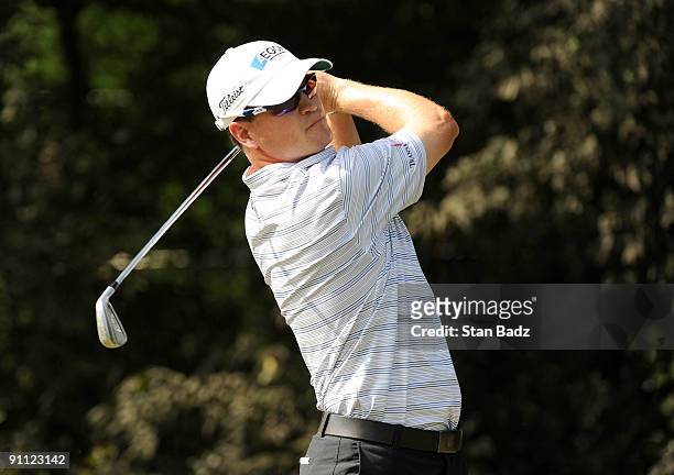 Zach Johnson hits to the 11th green during the first round of THE TOUR Championship presented by Coca-Cola, the final event of the PGA TOUR Playoffs...