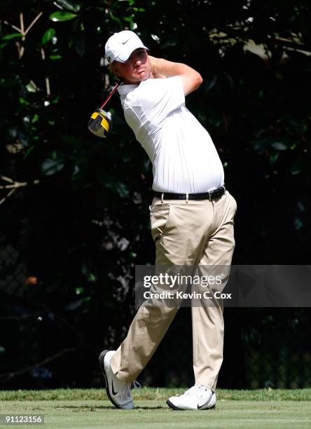 Lucas Glover tees off the fourth hole during the first round of THE TOUR Championship presented by Coca-Cola, the final event of the PGA TOUR...