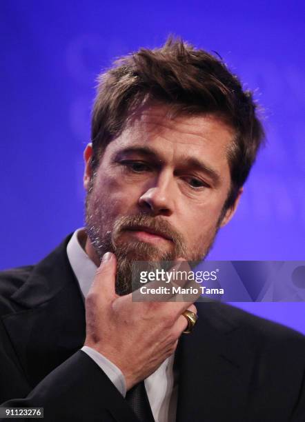 Actor Brad Pitt looks on while discussing post-Katrina New Orleans at the Clinton Global Initiative September 24, 2009 in New York City. The fifth...
