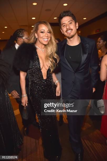 Recording artist Mariah Carey and Bryan Tanaka attend the Clive Davis and Recording Academy Pre-GRAMMY Gala and GRAMMY Salute to Industry Icons...