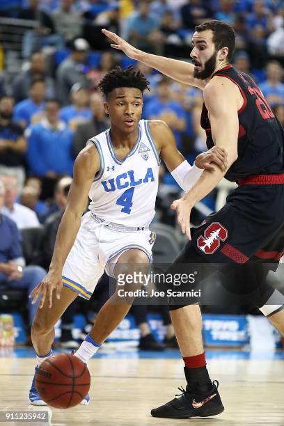 Jaylen Hands of the UCLA Bruins moves around Josh Sharma of the Stanford Cardinal at Pauley Pavilion on January 27, 2018 in Los Angeles, California.