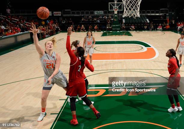 Miami forward/center Emese Hof shoots during a women's college basketball game between the University of Louisville Cardinals and the University of...