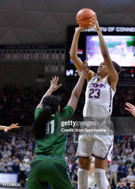 UConn Huskies Forward Azura Stevens shoots over Tulane Green Wave Guard Tatyana Lofton during the game as the UConn Huskies host the Tulane Green...