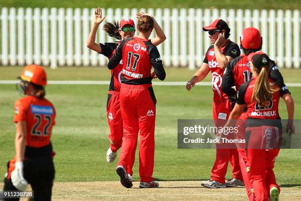 Amy Satterthwaite of the Renegades celebrates the wicket of Lauren Ebsary of the Scorchers with her team mates during the Women's Big Bash League...