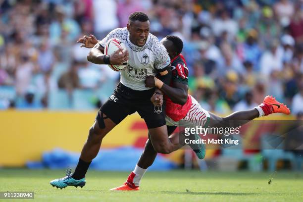 Alasio Sovita Naduva of Fiji is tackled in the game against Kenya during day three of the 2018 Sydney Sevens at Allianz Stadium on January 28, 2018...
