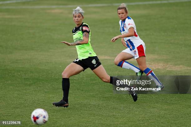 Micelle Heyman of Canberra United receives a pass as Cassidy Davis of Newcastle United looks on during the round 13 W-League match between Canberra...