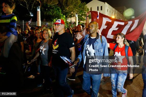 Rene Gonzalez , one of the so-called Cuban Five, walks next to his wife Olga Salanueva as Cuba celebrates the 165 anniversary of the birth of its...