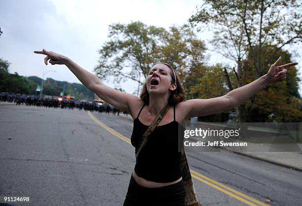 Crystal Hoffman of Johnstown, Pennsylvania speaks to a crowd of students gathered behind riot police lines in the Oakland section September 24, 2009...