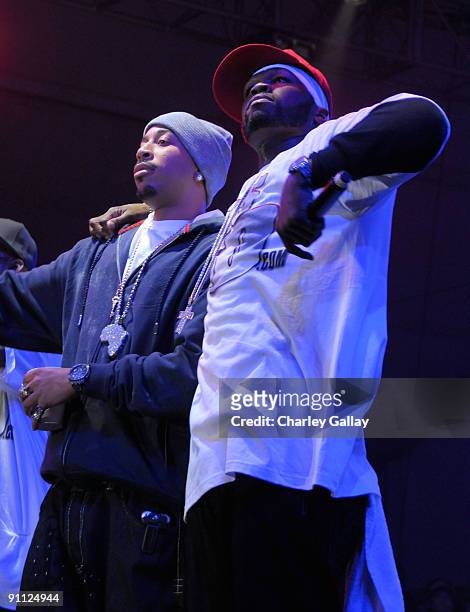 Rapper 50 Cent and Chris 'Ludacris' Bridges perform at the Celebrity Beach Bowl presented by Matt Leinart at the Scottsdale Waterfront at Stetson...