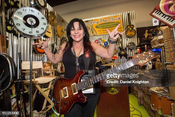 Musician Roni Lee poses for a photo at the Rocking The Clock booth at The 2018 NAMM Show at Anaheim Convention Center on January 27, 2018 in Anaheim,...