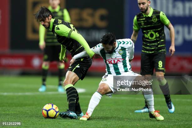 Sporting's midfielder Bryan Ruiz vies with Setubal's Portuguese midfielder Joao Costinha during the Portuguese League Cup 2017/18 Final, match...