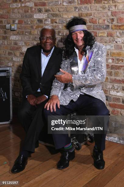 Sir Trevor McDonald and Jon Snow pose ahead of the performance at the "Newsroom's Got Talent" event held in aid of Leonard Cheshire Disability and...