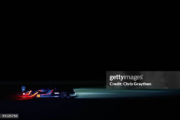 The Team Puegeot Total Peugeot 908 HDI FAP driven by Franck Montagny and Stephane Sarrazin drives during practice for the American Le Mans Series...