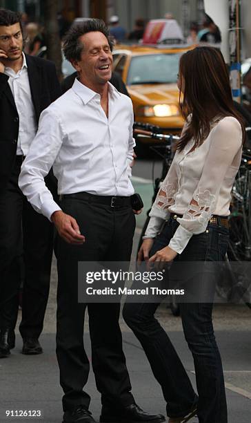 Movie producer Brian Grazer and Chau-Giang Thi Nguyen are seen on the Streets of Manhattan on September 24, 2009 in New York City.