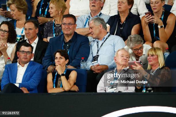 Victoria Premier Daniel Andrews, Tennis Australia chair Jayne Hrdlicka and tennis legend Rod Laver watch the men's singles final between Roger...