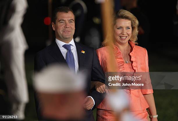 Russian President Dmitry Medvedev and first lady Svetlana Medvedeva arriveat the Phipps Conservatory for the G-20 Summit on September 24, 2009 in...