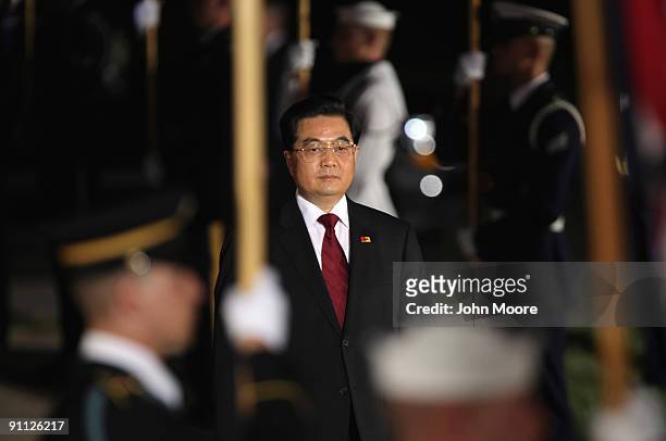 Chinese President Hu Jintao arrives at the Phipps Conservatory for the G-20 Summit on September 24, 2009 in Pittsburgh, Pennsylvania. President Obama...