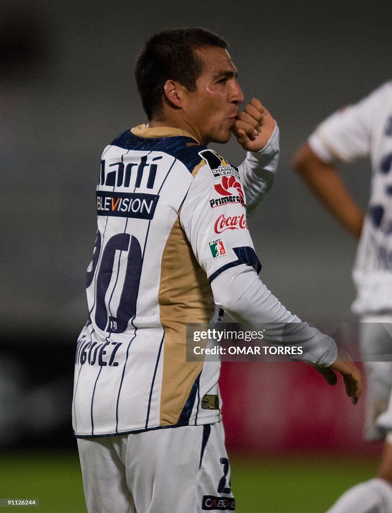 Ismael Iniguez of Pumas celebrates the t