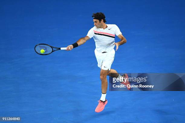 Roger Federer of Switzerland plays a forehand in his men's singles final match against Marin Cilic of Croatia on day 14 of the 2018 Australian Open...