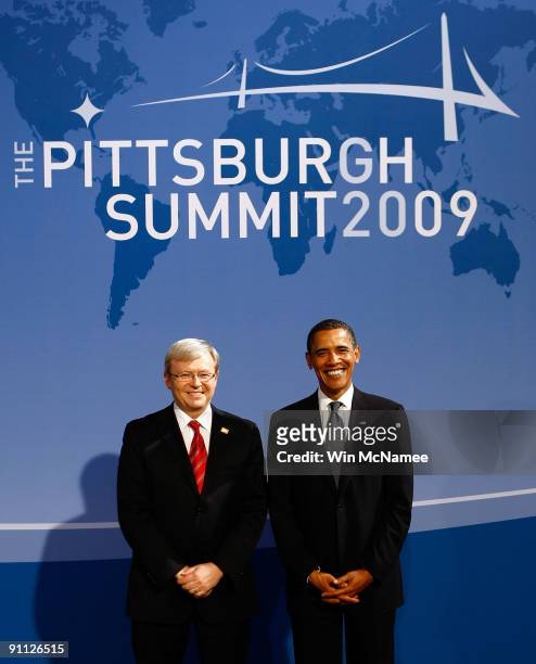 President Barack Obama welcomes Australian Prime Minister Kevin Rudd to the welcoming dinner for G-20 leaders at the Phipps Conservatory on September...