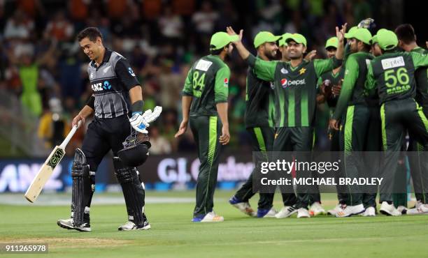 New Zealand's Ross Taylor is dismissed during the third Twenty20 international cricket match between New Zealand and Pakistan at Bay Oval in Mount...