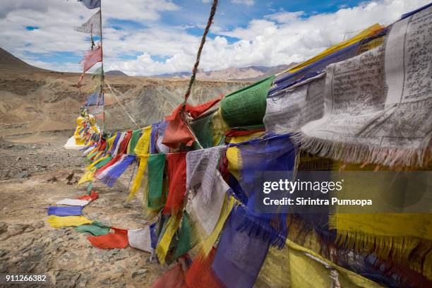 beautiful landscape of pagodas and prayer flags near confluence of the indus and zanskar rivers in leh, ladakh, jammu and kashmir, india - leh stock pictures, royalty-free photos & images