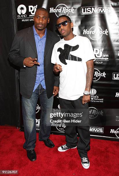 Brandon Jacobs and Fabolous attend the 3rd annual Tiki Rocks The Square for the Children's Miracle Network at the Hard Rock Cafe, Times Square on...