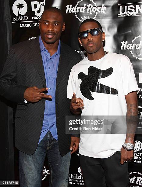 Brandon Jacobs and Fabolous attend the 3rd annual Tiki Rocks The Square for the Children's Miracle Network at the Hard Rock Cafe, Times Square on...