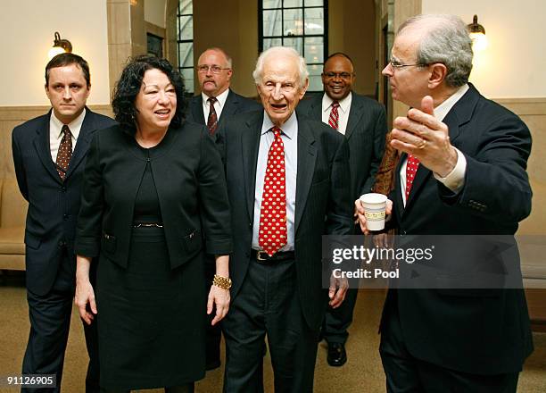 Jonathan Lippman , Chief Judge of the State of New York, and Robert M. Morgenthau , New York County District Attorney, escort newly appointed Justice...