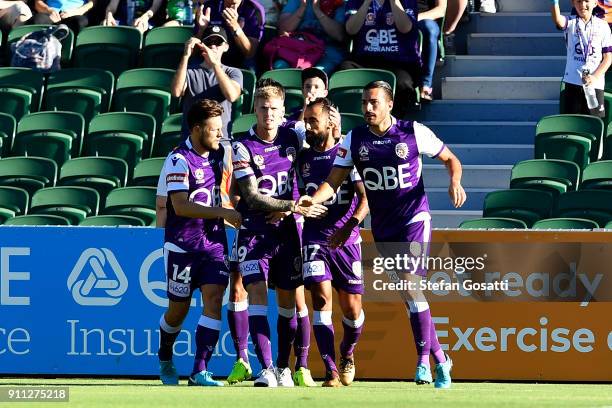 Diego Castro of the Glory celebrates with team mates after scoring during the round 18 A-League match between the Perth Glory and the Western Sydney...