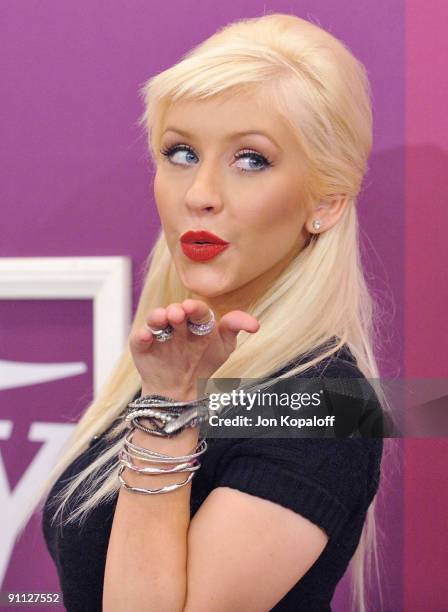 Singer Christina Aguilera arrives at Variety's 1st Annual Power Of Women Luncheon at The Beverly Wilshire Hotel on September 24, 2009 in Beverly...