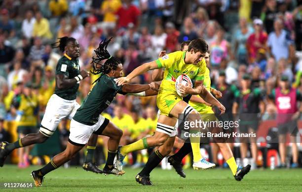 Lachlan Anderson of Australia breaks away from the defence in the MenÕs final match against South Africa during day three of the 2018 Sydney Sevens...