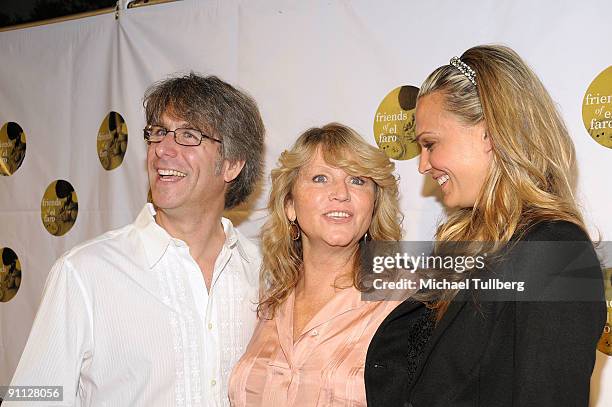 Actress/model Molly Sims arrives with Friends Of El Faro founders Adam Smith and Leigh Calton Smith at the 6th Annual Friends Of El Faro Event to...