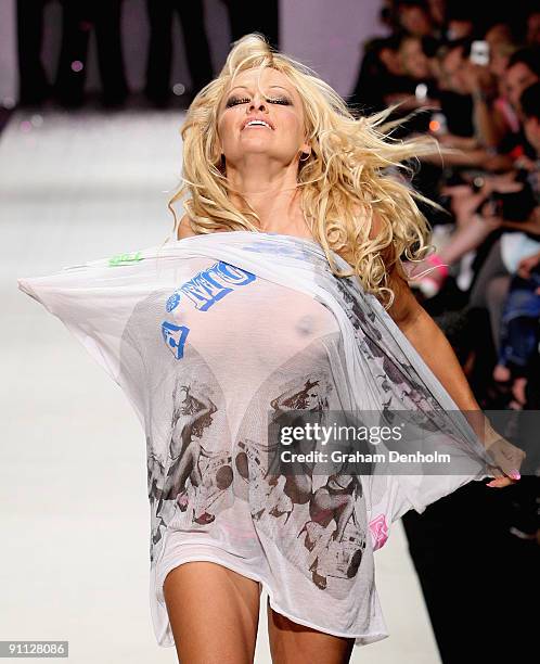 Pamela Anderson walks the catwalk following the A Muse by Richie Rich collection show on day four of Air New Zealand Fashion Week 2009 at the Westpac...