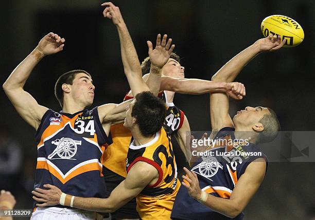 Serhat Temel of Calder Cannons attempts a mark during the TAC Cup Grand Final match between the Dandenong Stingrays and the Calder Canons at Etihad...