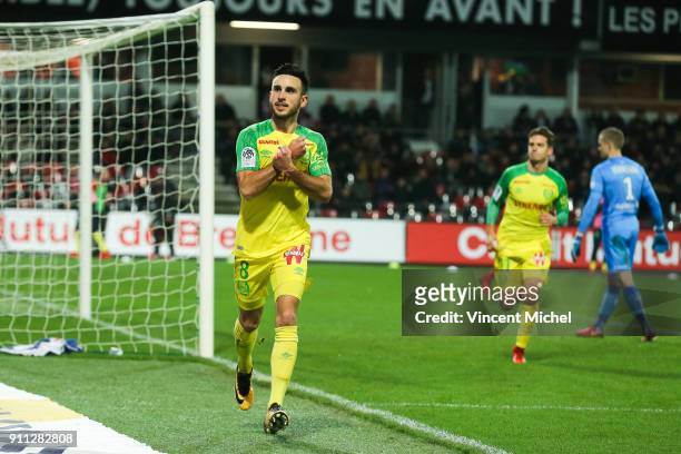 Adrien Thomasson of Nantes celebrates as he scores the first goal during the Ligue 1 match between EA Guingamp and Nantes at Stade du Roudourou on...