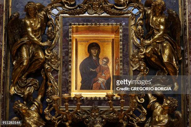 The restored icon of Mary Salus Populi Romani is pictured at the end of a Mass celebrated by Pope Francis at St. Mary Major Basilica in Rome, on...