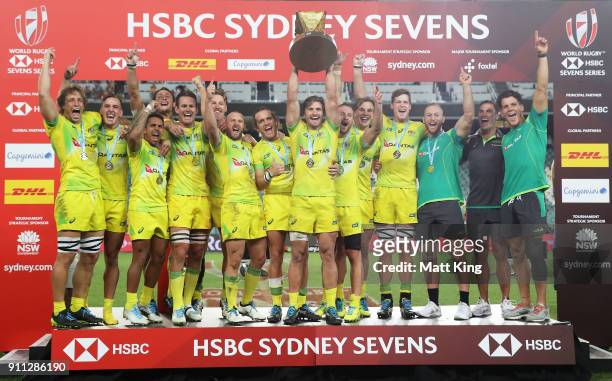 Australia celebrate victory in the Men's final match after defeating South Africa during day three of the 2018 Sydney Sevens at Allianz Stadium on...