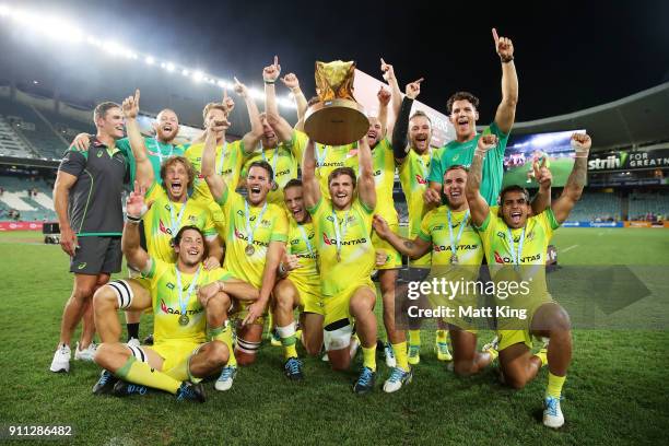 Australia celebrate victory in the Men's final match after defeating South Africa during day three of the 2018 Sydney Sevens at Allianz Stadium on...