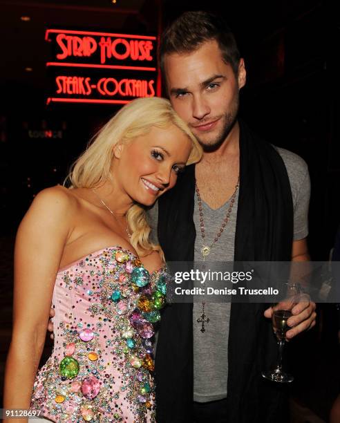 Holly Madison and Josh Strickland pose for photos after "Peepshow" at Planet Hollywood Resort and Casino on September 24, 2009 in Las Vegas, Nevada.