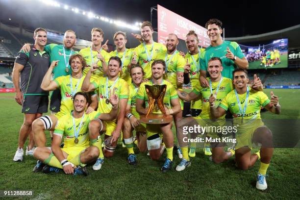 Australia celebrate victory in the Men's final match after defeating South Africa during day three of the 2018 Sydney Sevens at Allianz Stadium on...