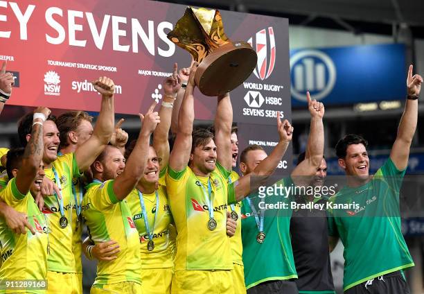 Australia celebrate victory after defeating South Africa in the MenÕs final match during day three of the 2018 Sydney Sevens at Allianz Stadium on...