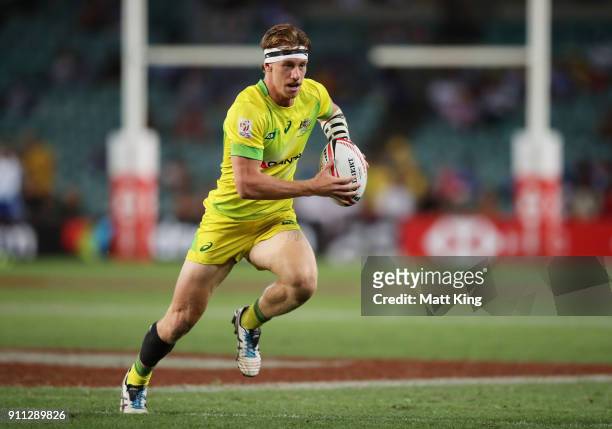 Ben O'Donnell of Australia runs with the ball in the Men's final match against South Africa during day three of the 2018 Sydney Sevens at Allianz...
