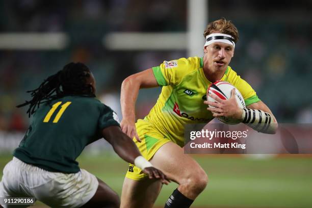 Ben O'Donnell of Australia runs with the ball in the Men's final match against South Africa during day three of the 2018 Sydney Sevens at Allianz...