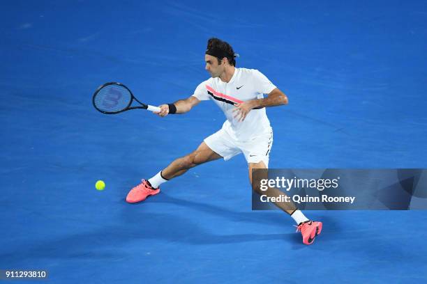 Roger Federer of Switzerland plays a forehand in his men's singles final match against Marin Cilic of Croatia on day 14 of the 2018 Australian Open...