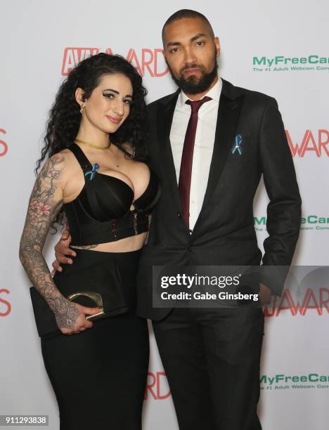 Adult film actress Arabelle Raphael and adult film actor Mickey Mod attend the 2018 Adult Video News Awards at the Hard Rock Hotel & Casino on...