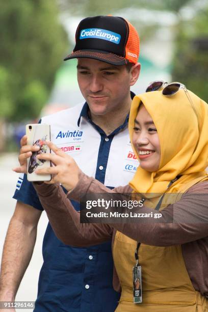 Xavier Simeon of Belgium and Reale Avintia Racing poses with fans in paddock during the MotoGP testing at Sepang Circuit on January 28, 2018 in Kuala...