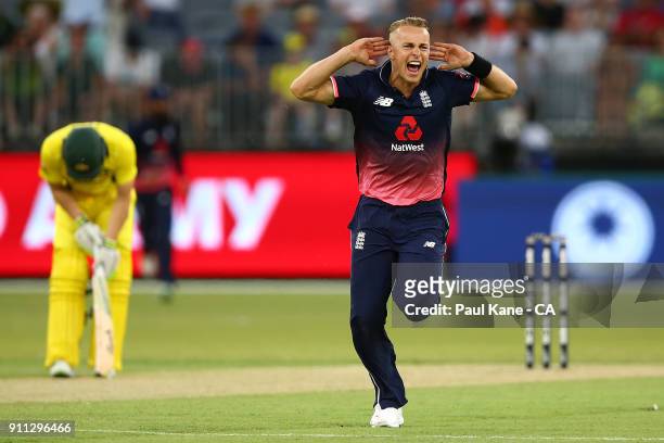 Tom Curran of England celebrates the wicket of Adam Zampa of Australia during game five of the One Day International match between Australia and...