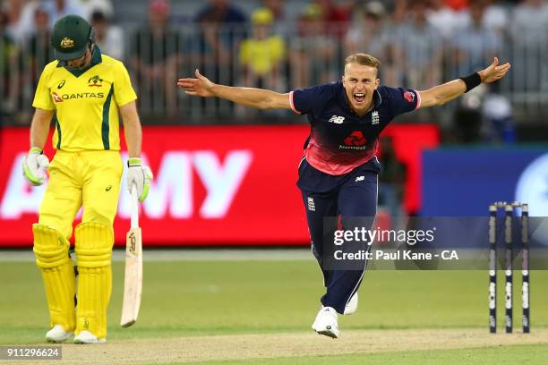 Tom Curran of England celebrates the wicket of Adam Zampa of Australia during game five of the One Day International match between Australia and...