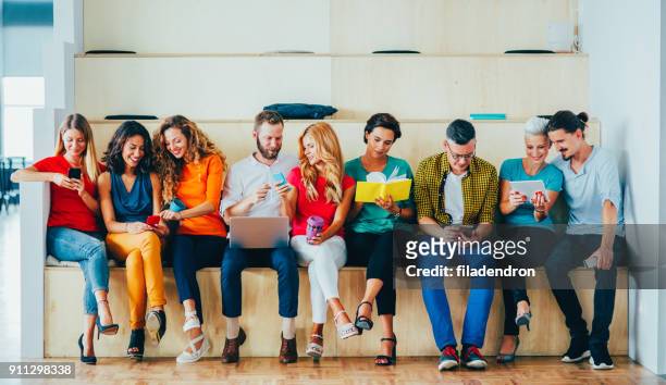 different lifestyles concept - people sitting in a row stock pictures, royalty-free photos & images